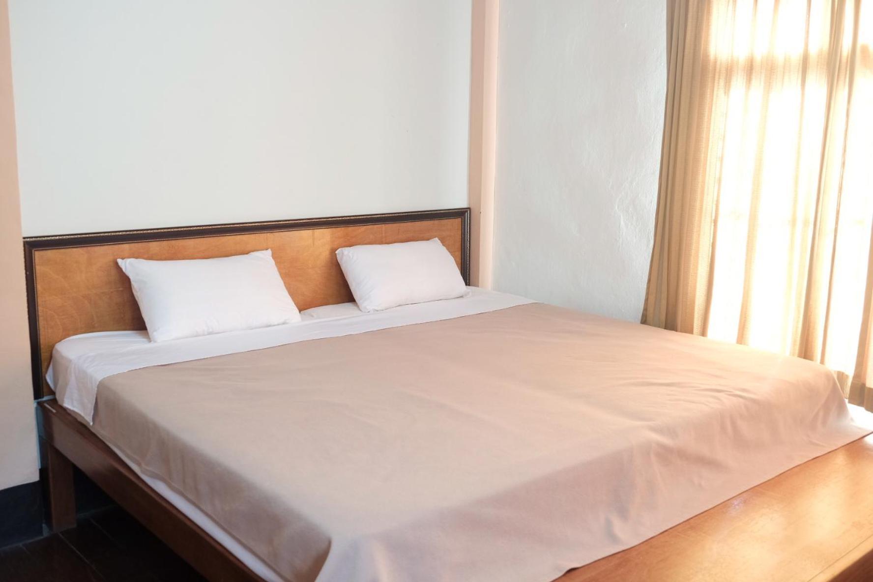 Manilath Guesthouse Ban Houayxay Zimmer foto